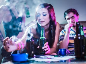 Stock photo of a stereotypical Millennial at a party.