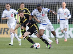 Impact forward Didier Drogba, battling Crew's Wil Trapp, had a goal and two assists from five shots in Montreal's 4-4 tie in Columbus on Saturday.