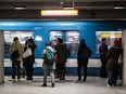 People waiting for the Orange line metro towards Cote-Vertu at the Berri Metro Station in Montreal on April 3, 2013.