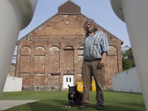 Harvey Lev, owner of New City Gas, in the main garden in front of the establishment, on Monday July 6, 2015.