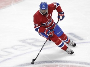 P.K. Subban of the  Montreal Canadiens moves the puck against the Buffalo Sabres in the second period of an NHL game at the Bell Centre in Montreal Thursday, March 10, 2016.