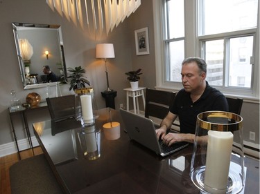 John Hislop lives in a very stunning apartment. Here, he is seen in his bright dining room. He works as an event planner in the IT industry but he is also the owner of a Mexican restaurant in Dorval. (Marie-France Coallier/ MONTREAL GAZETTE)