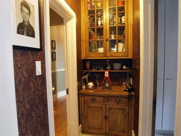 Between the kitchen and the hallway is a tiny room with a built-in, glass-fronted, cupboard that may have been a butler's pantry at one point. There's also a glass-fronted built-in cupboard in the dining room.  (Marie-France Coallier/ MONTREAL GAZETTE)