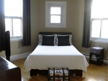 This is the other bedroom, which is very bright with interesting windows of differing sizes. (Marie-France Coallier/ MONTREAL GAZETTE)