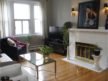 The living room has a gas fireplace. (Marie-France Coallier/ MONTREAL GAZETTE)