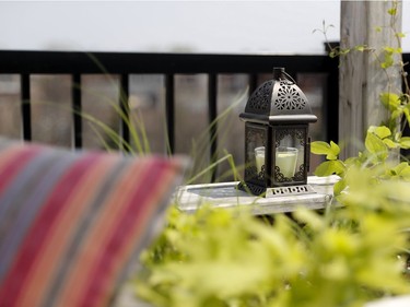 A candle sits on the second floor balcony. (Allen McInnis / MONTREAL GAZETTE)