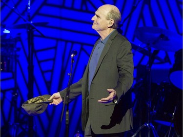 Boston-born James Taylor acknowledges crowd's cheers at the Bell Centre in Montreal on Friday, May 13, 2016.