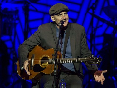 James Taylor speaks with the crowd at the Bell Centre in Montreal on Friday, May 13, 2016.