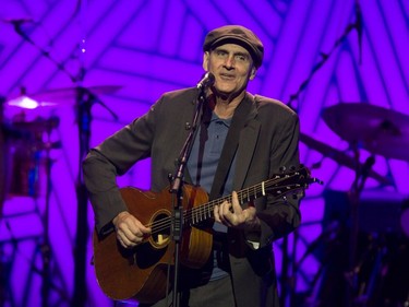James Taylor performs at the Bell Centre in Montreal on Friday, May 13, 2016. He recorded his first album for the Beatles' Apple label in 1968.