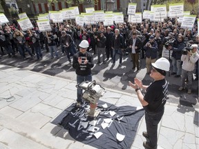 Striking Montreal city engineers and supporters demonstrate outside Montreal city hall May 17, 2016.