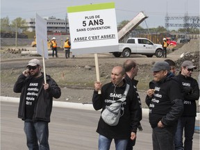 Striking Montreal city engineers and supporters demonstrate outside Université de Montreal science complex construction site in Outremont May 18, 2016.