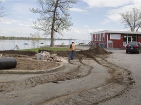 Grass is now being planted in the space once occupied by a storage shed at the Venture Sailing Club by Lake St. Louis in Pointe Claire, west of Montreal city, Thursday May 19, 2016. The shed was demolished by the city. (Phil Carpenter/MONTREAL GAZETTE)