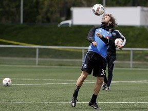 Montreal Impact forward Lucas Ontivero heads the ball during a team practice in Montreal on Thursday May 19, 2016.