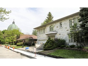 This house at 41 Roxborough Ave. in Westmount sold for $3.2 million, making it the highest priced piece of residential real estate sold in Montreal last week. The dome of St. Joseph's Oratory can be seen at left.  (John Mahoney/ MONTREAL GAZETTE)