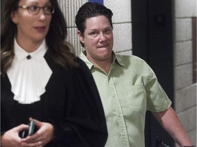 Former Montreal police officer Stéfanie Trudeau, left, also known as Agent 728, after her sentencing hearing at Palais de Justice in Montreal May 26, 2016.