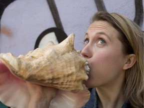 Sketchfest Montreal director Erin Hall blows the "sacred comedy conch" at Théâtre Ste-Catherine, one of the venues for the festival, which runs Thursday to May 14, 2016.