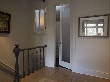 The staircase leading to the second floor with the bathroom behind the door. (Pierre Obendrauf / MONTREAL GAZETTE)