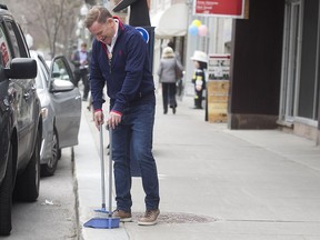 Glenn Neven has a dirty job to do outside his Birkenstock store on Greene Ave. He is making a public appeal to dog owners to abide by municipal bylaws and pick up after their pets.