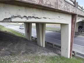 The overpass at Montée Cadieux at Highway 40 on Saturday May 7, 2016 shows impressive damage. Transport Quebec has closed the overpass to vehicle traffic following a routine inspection of the structure. (Pierre Obendrauf / MONTREAL GAZETTE)