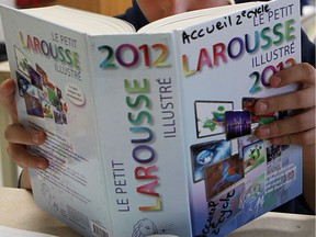 A student in a classe d'accueil for immigrants delves into his Larousse. "When it comes to teaching the language, the key is to improve the level of French taught to ensure sustainability and appeal. Since the 1990s, the Quebec education system has let francophones down. Badly," Lise Ravary writes.