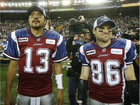 Alouettes quarterback Anthony Calvillo, left, and slotback Ben Cahoon, watch as time runs out in the CFL Eastern Division final against the B.C. Lions at Olympic Stadium on Nov. 22, 2009. The pair could be reunited if Cahoon returns to the Als as a coach.