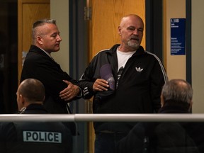 Sergio Piccirilli, centre, leaves the Laval courthouse on Tuesday, Sept. 29, 2015 after his trial was moved to November 13, 2015. Piccalilli is standing trial in a weapons and drug trafficking case, Operation Cleopatra.