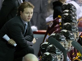 "My dad always encouraged me to be a student of the game, and I became very analytical at a young age because of that," says Lac St. Louis Lions midget Triple-A head coach Jon Goyens, behind the bench in  2012.