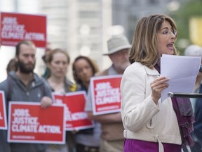 Canadian author, social activist, and filmmaker Naomi Klein speaks during an outdoor press conference in support of a protest called the March for Jobs, Justice and the Climate in the financial district in Toronto, Ontario, Thursday May 21, 2015. Klein is to speak at the World Social Forum in Montreal, to be held Aug. 9-13.