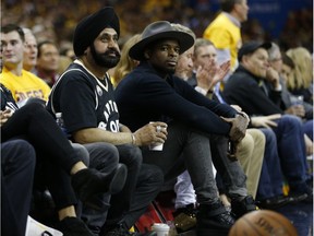 Toronto Raptors "Superfan" Nav Bhatia sits beside Canadiens' P.K. Subban for Game 1 of the Raptors-Cavaliers series in Cleveland and was planning be with him again for Game 5 Wednesday night.