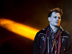 Johnny Depp, guitarist of U.S. band Hollywood Vampires, performs at the Rock in Rio Lisboa music festival at Bela Vista Park in Lisbon on May 27, 2016.