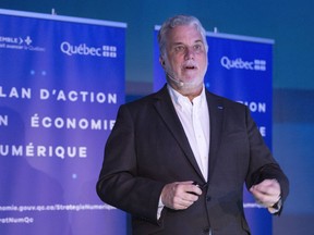 Quebec Premier Philippe Couillard outlines his government's policies on the digital economy, in Montreal on Friday, May 20, 2016. Youth groups have asked him to intervene in the province’s planned welfare legislation reform.