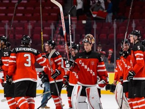 Team Canada players salute crowd after their victory over Team Slovakia during the 2015 IIHF World Junior Hockey Championship game at the Bell Centre on Dec. 26, 2014. The empty seats at the Bell Centre were not forgotten when Hockey Canada put tickets on sale for the 2017 event this week.