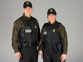 Sûreté du Québec officers model the new uniform