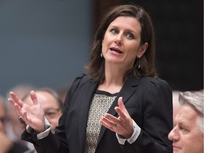 Quebec Justice Minister Stephanie Vallee responds to the Opposition on a bill during question period Wednesday, May 25, 2016 at the legislature in Quebec City.