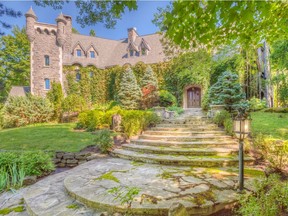 The main structure of this castle-like home in Senneville was built in 1985. It underwent an expansion and major renovations in 2000 and 2001.
(Photo by Michael Green Photography,  courtesy Provision Immobilier)