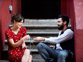 Director John Carney says Keira Knightley, pictured with Adam Levine in Begin Again, didn't hit the right notes on the film's set.