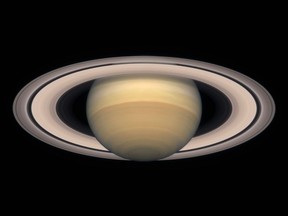 Saturn, as seen by NASA's Casini spacecraft. Your view from the ground might be a teeny bit different. But cool, nonetheless.
