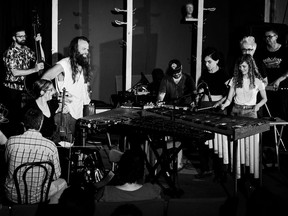 "I have all these mallet instruments, and all these friends who are brilliant at a million different instruments, and they all seem to love this minimalist music,” says Thor Harris (with white shirt and beard). For his Suoni Per Il Popolo show, the veteran percussionist's collective will include members of Godspeed You! Black Emperor, the Besnard Lakes, Timber Timbre and others.