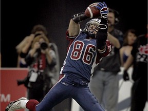 Alouettes' Ben Cahoon makes a leaping catch of an Anthony Calvillo pass in the second half of the 2005 Grey Cup in Vancouver.
