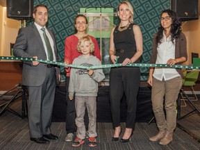 From left: Tony Capotosto, district vice-president, TD Canada Trust; Pascale Fleury, regional coordinator, YMCAs of Quebec; Yannick Fleury-Léger, 8, resident of Sud-Ouest borough; Tamara Piniach, TD branch manager; Laura Handal Lopez, Little Burgundy coordinator, YMCAs of Quebec.