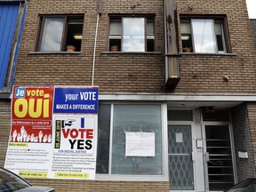 A referendum announcement sign is posted on the wall of 406 Legendre St. in Montreal on Wednesday, June 1, 2016.