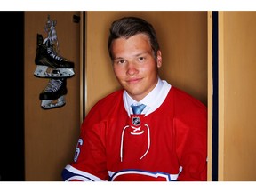 Mikhail Sergachev poses for a portrait after being selected ninth overall by the Montreal Canadiens in round one during the 2016 NHL Draft on June 24, 2016 in Buffalo, New York.
