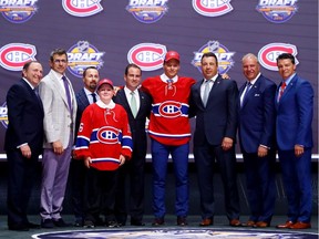 BUFFALO, NY - JUNE 24:  Mikhail Sergachev celebrates with the Montreal Canadiens after being selected ninth overall during round one of the 2016 NHL Draft on June 24, 2016 in Buffalo, New York.