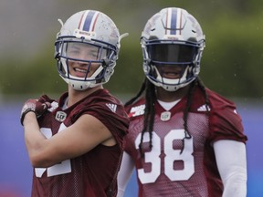 Mitchell White, left, and Dominique Ellis at the Alouettes training camp in May. Both have been released by the team.