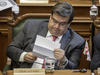 14h35 - Montreal Mayor Denis Coderre reacts as he reads a note during a Montreal city council meeting at city hall in Montreal on Monday, June 20, 2016.