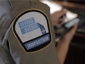 A Revenue Quebec inspector at work.