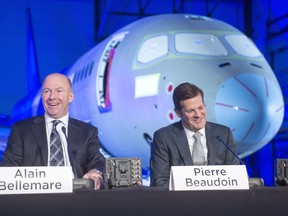 Bombardier's chief executive Alain Bellemare, left, and executive chairman Pierre Beaudoin get set to start the company's annual meeting April 29, 2016, Mirabel.