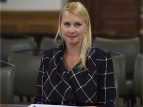 Former Transport Ministry analyst Annie Trudel waits her turn to testify at a legislature committee Wednesday, June 8, 2016 at the legislature in Quebec City.