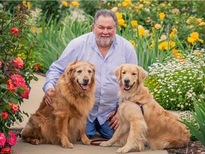 Aubrey Fine, a California-based psychologist and professor, is an expert in the field of animal assisted therapy. He is seen here with his two Golden Retrievers, Magic, left and Ketzy. Fine will give a daylong conference in Montreal on Sunday on the human-animal bond and animal assisted therapy.