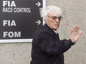 Formula One boss Bernie Ecclestone waves as he arrives at the Circuit Gilles Villeneuve during the open house day the Canadian Grand Prix Thursday, June 9, 2016 in Montreal.